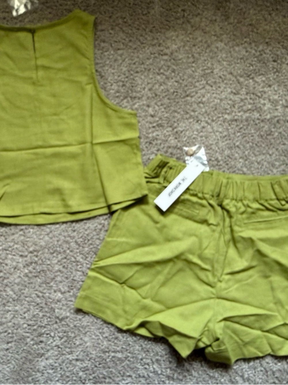Two-Piece Lime Green Tank and Shorts Set
The Workshop